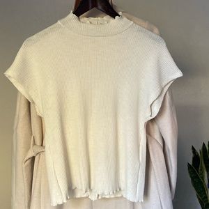 White ruffled turtle neck